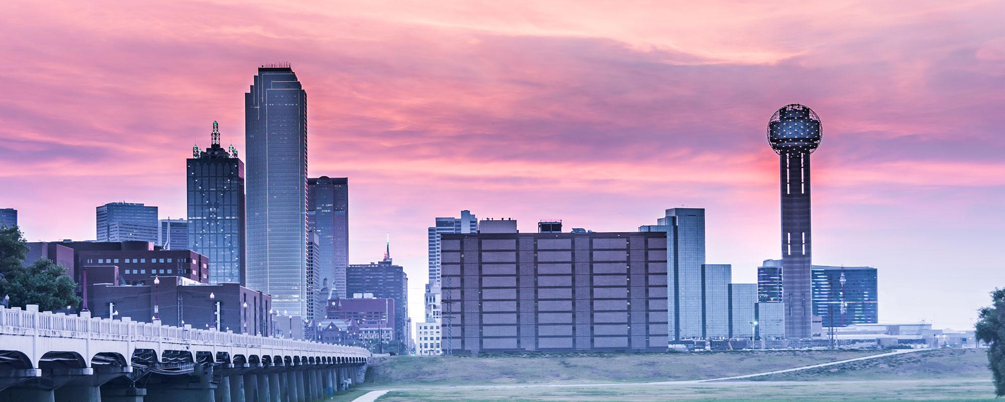 Dallas panoramic skyline with pink and orange sunset