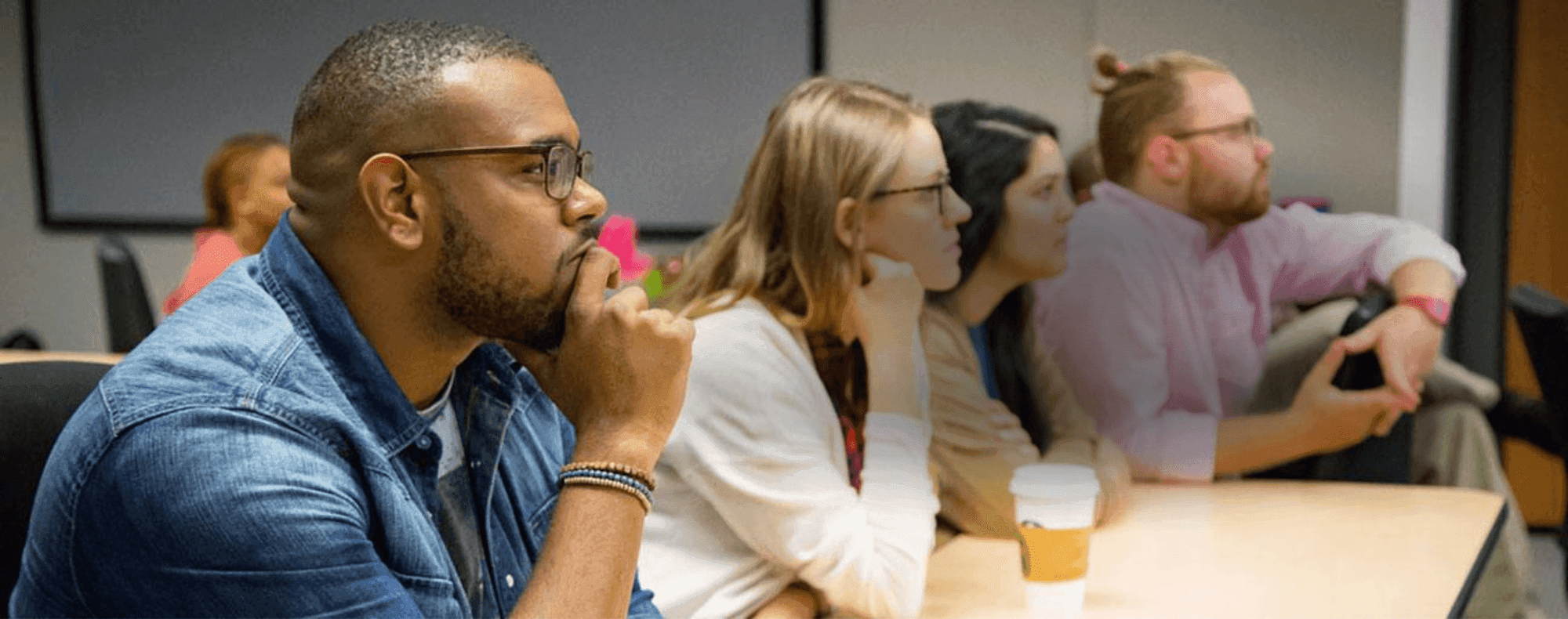 Aspiring DFW teachers listen to a lesson in an education class